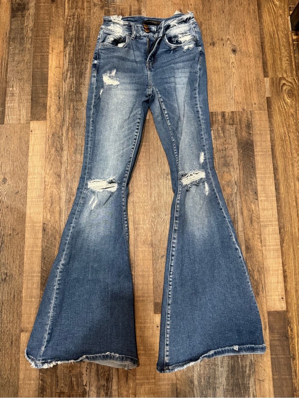 Mid-Rise Distressed Flared Jeans — Blue